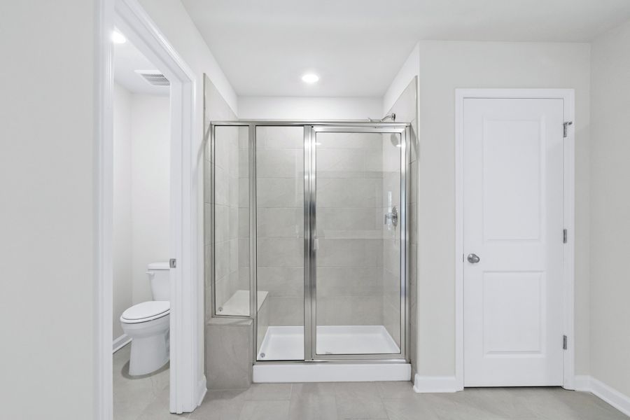 Furnished interior view inside a new home in Waterside - Coastline Series, Longs (Image 9). Furnished interior view inside a new home in Waterside - Coastline Series, Longs (Image 9).