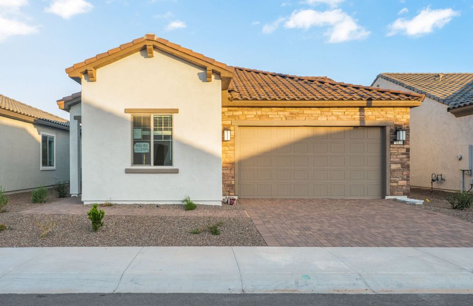 Exterior details and patio area of a home in Sun City Festival, Buckeye (Image 17).