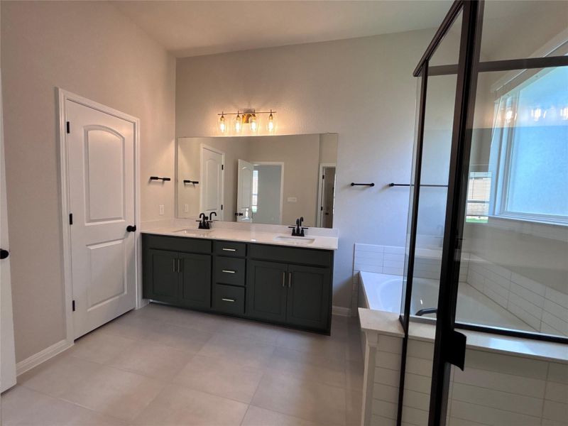 Furnished interior view inside a new home in The Colony 50s, Cedar Creek (Image 5).