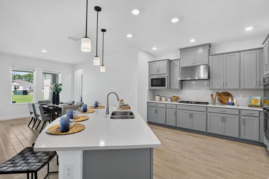 Representative furnished interior of a home built from the Abaco by Taylor Morrison in Ardisia Park, New Smyrna Beach (Image 10).