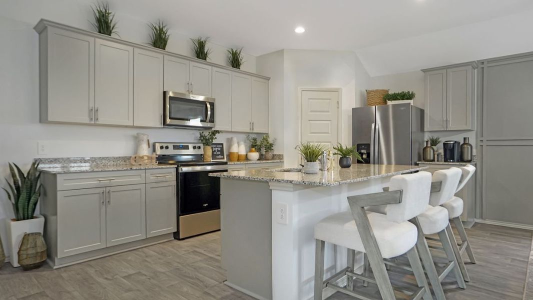 Representative furnished interior of a home built from the GAVEN by D.R. Horton in Westward Pointe, Sealy (Image 6).