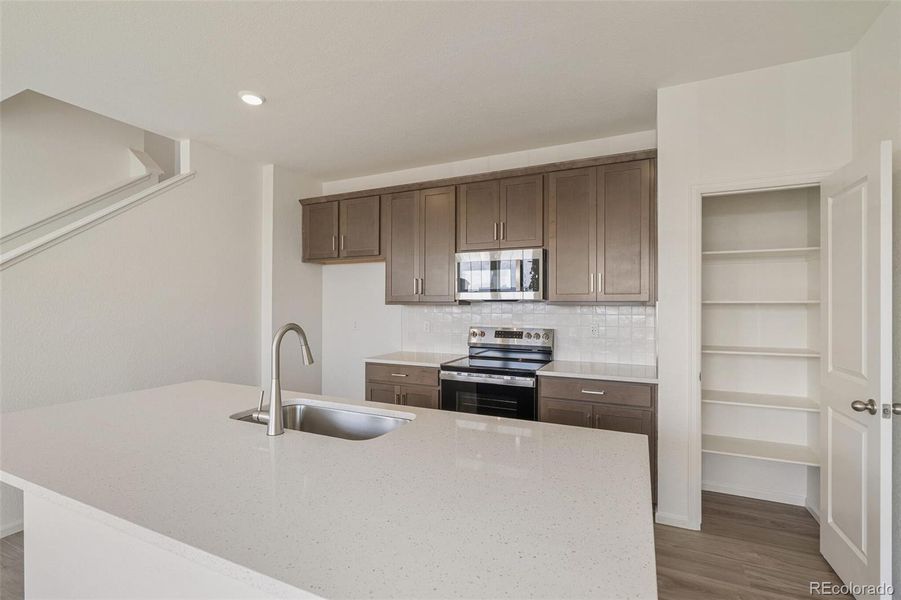 Furnished interior view inside a new home in Windler Villas, Aurora (Image 8).