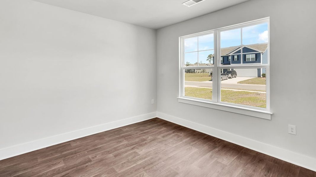 Spacious, unfurnished interior of a new home in Cedar Hill Landing, Navassa (Image 21). Spacious, unfurnished interior of a new home in Cedar Hill Landing, Navassa (Image 21).