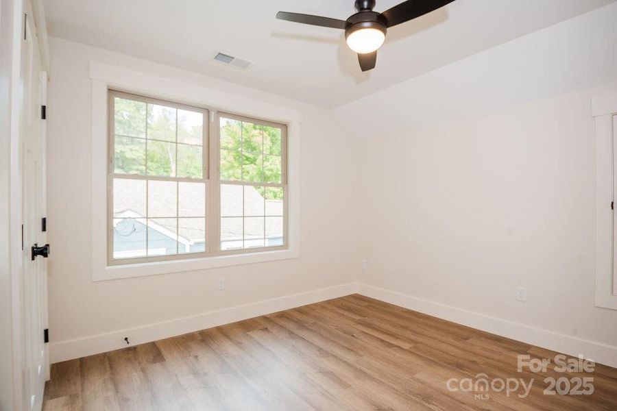 Spacious, unfurnished interior of a new home in , Asheville (Image 13).