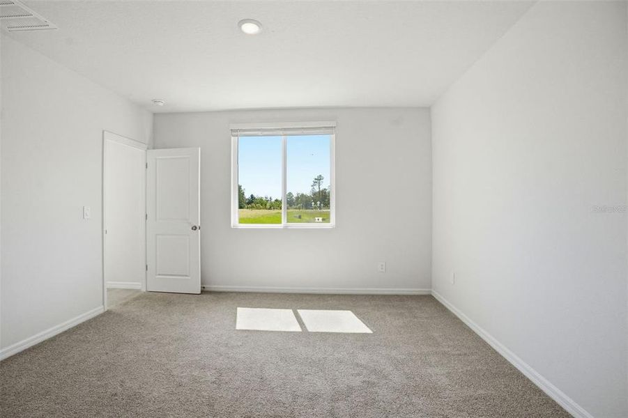 Spacious, unfurnished interior of a new home in Leyland Preserve - Premier Series, Brooksville (Image 28).