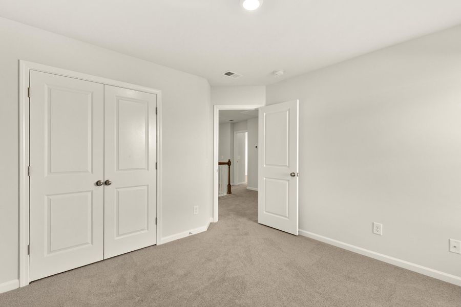 Spacious, unfurnished interior of a new home in Heron's Walk at Summers Corner: Coastal Collection, Summerville (Image 20). Spacious, unfurnished interior of a new home in Heron's Walk at Summers Corner: Coastal Collection, Summerville (Image 20).