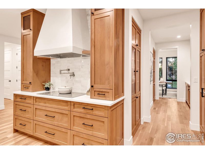 Kitchen connects to the formal dining room through the butler's pantry