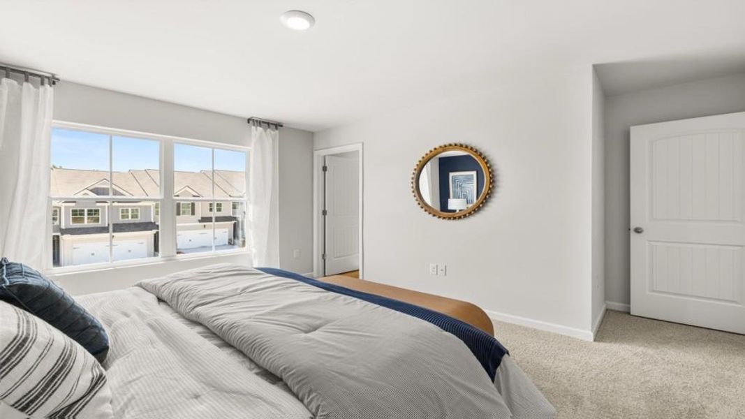 Furnished interior view inside a new home in Waypoint, Flowery Branch (Image 12).