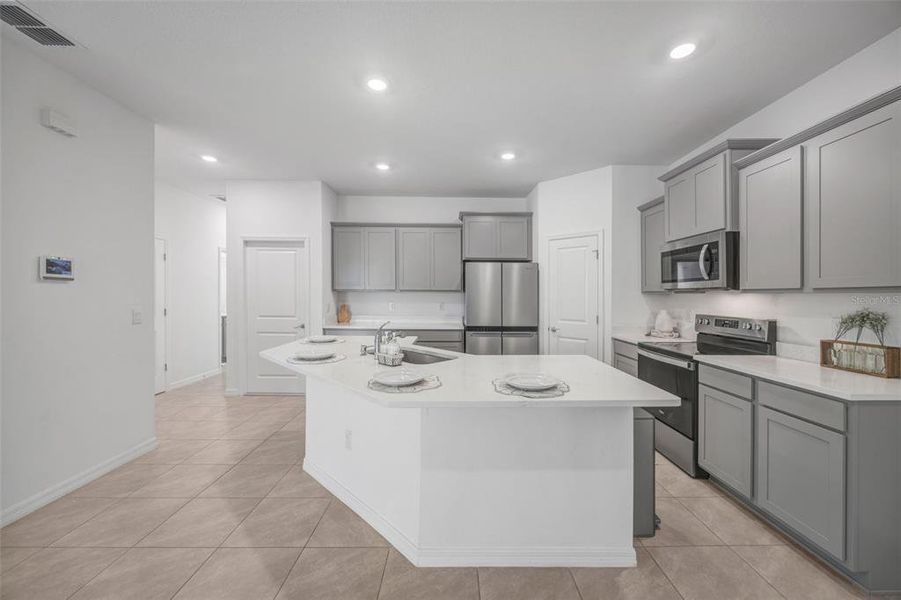 Furnished interior view inside a new home in Woodcreek, Wesley Chapel (Image 14).
