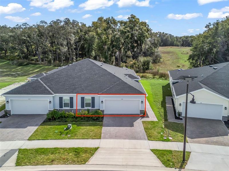 Front exterior of a new home in , Lady Lake, FL, highlighting curb appeal (Image 1). Front exterior of a new home in , Lady Lake, FL, highlighting curb appeal (Image 1).