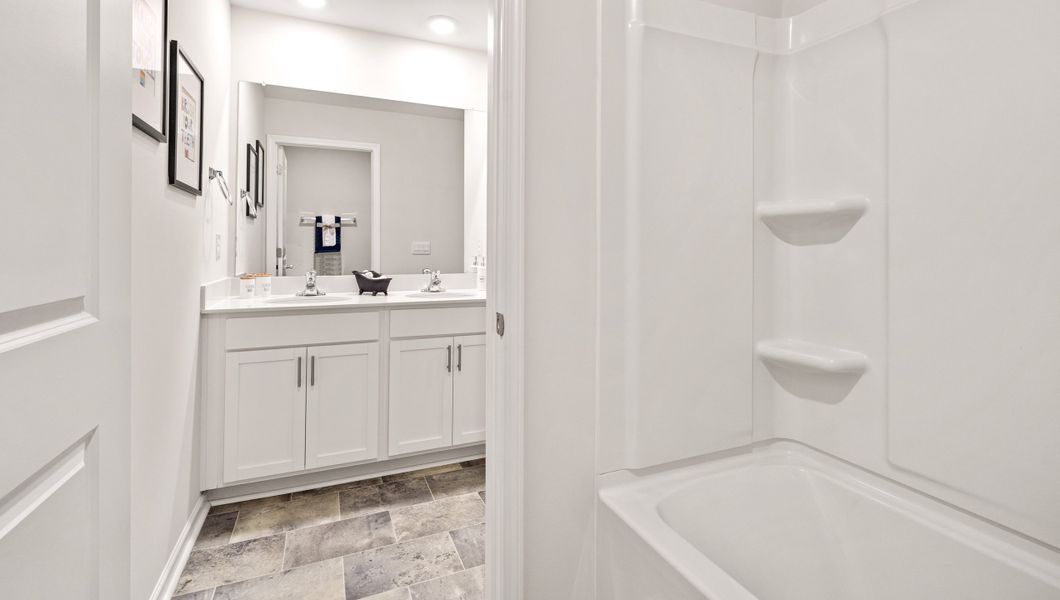 Representative furnished interior of a home built from the Hayden by D.R. Horton in Lakestone, Woodruff (Image 28).