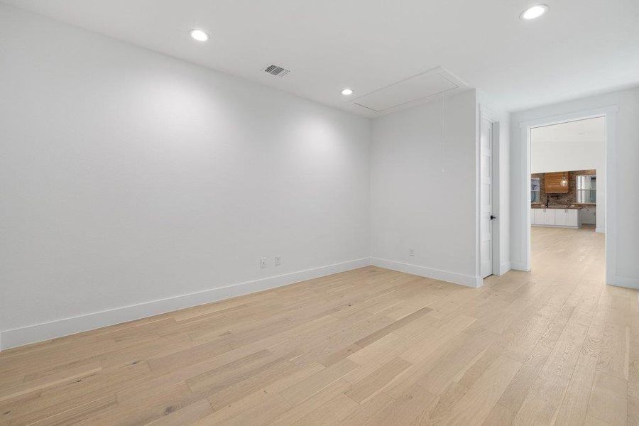 Unfurnished room featuring recessed lighting and light wood-style floors
