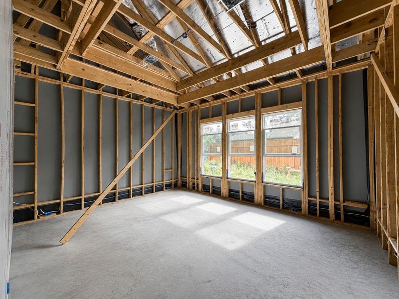 Light-Filled Primary Bedroom. Construction photo as of 08/18/2026