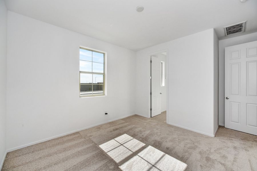 Spacious, unfurnished interior of a new home in Marbella at Windrose, Waddell (Image 36).