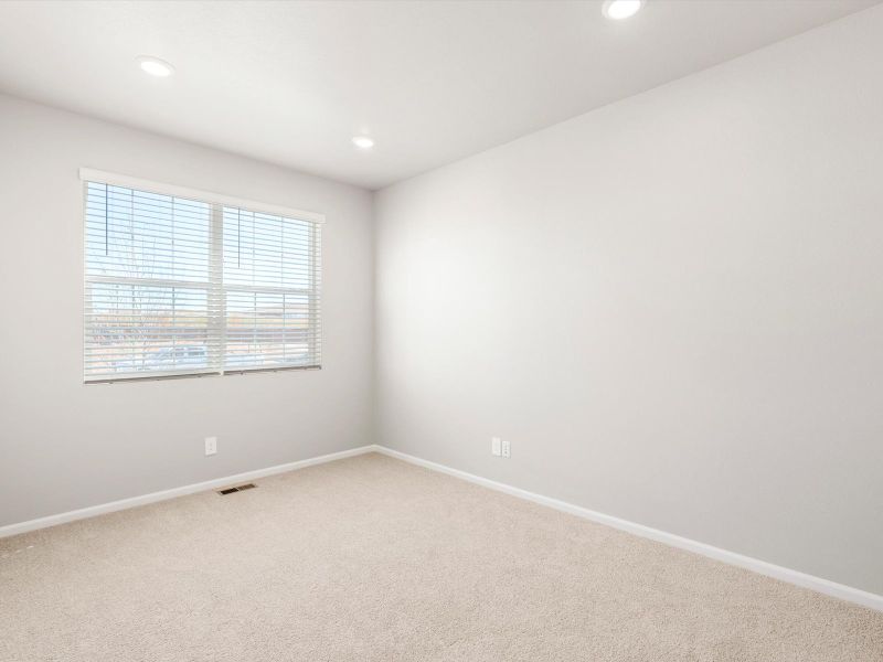Spacious, unfurnished interior of a new home in Buffalo Highlands: The Flora Collection, Commerce City (Image 10).
