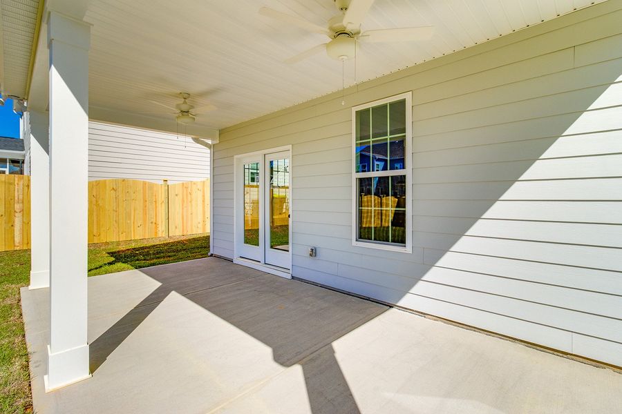 Exterior details and patio area of a home in Pebble Branch, Chapin (Image 3).