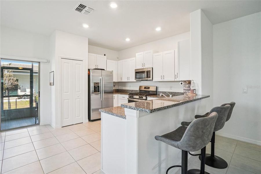 Furnished interior view inside a new home in Bryant Square: The Townes, New Port Richey (Image 12).