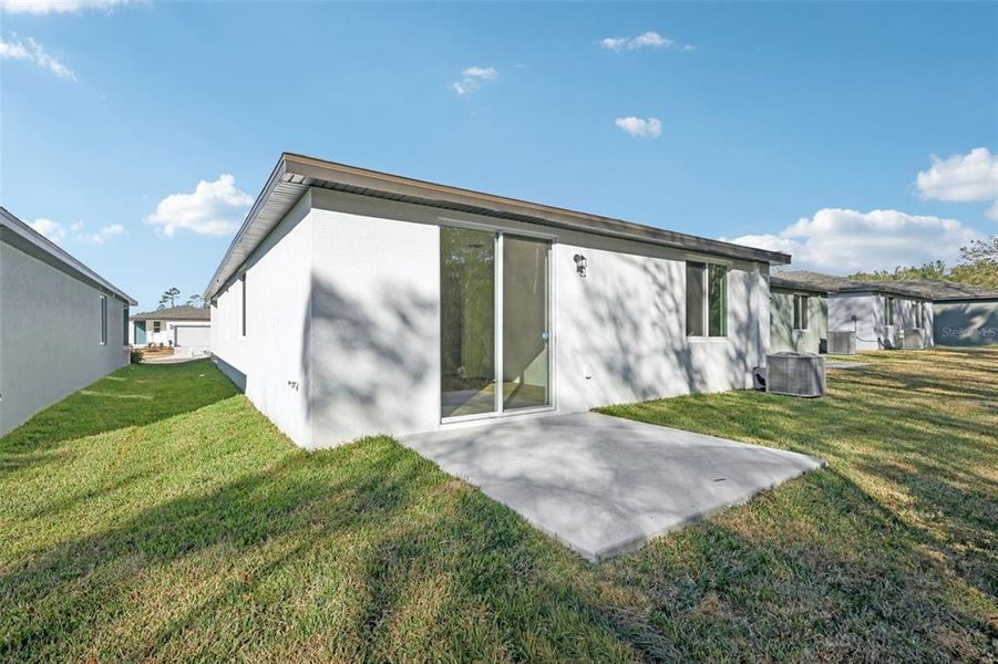 Exterior details and patio area of a home in , Brooksville (Image 3).