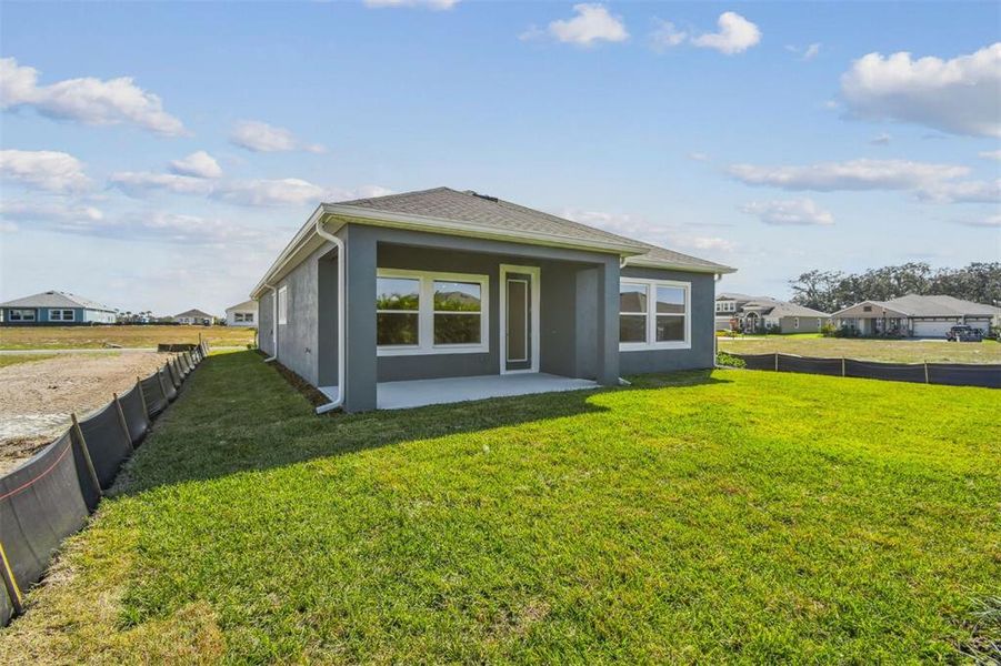 Exterior details and patio area of a home in Waterset Tradition Series, Apollo Beach (Image 24).