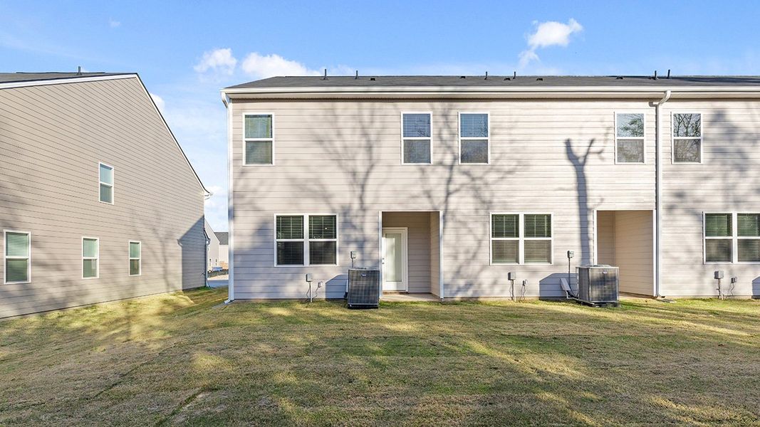 Exterior details and patio area of a home in Laurel Park Townhomes, Hephzibah (Image 2).