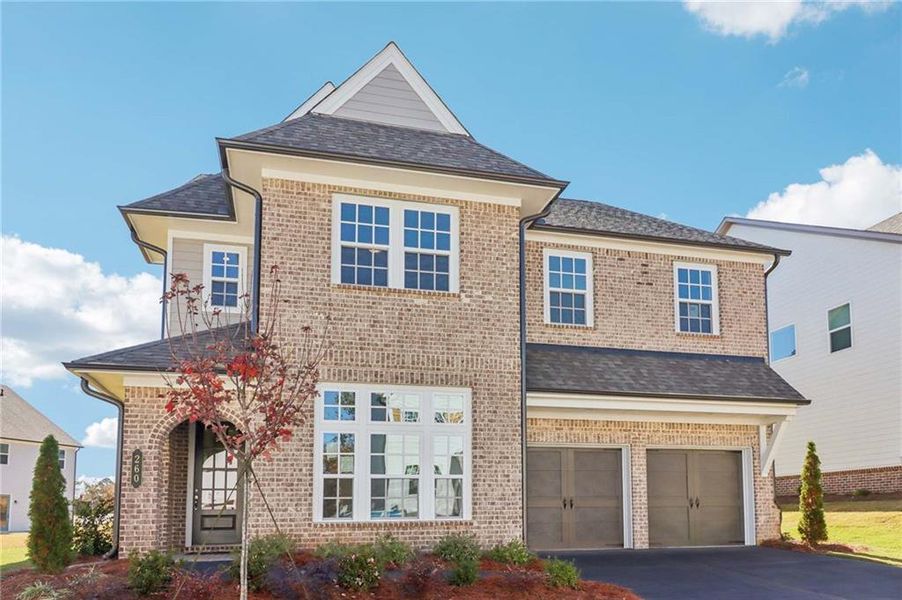 Front exterior of a new home in East Harbor II at Chestatee, Dawsonville, GA, highlighting curb appeal (Image 2).
