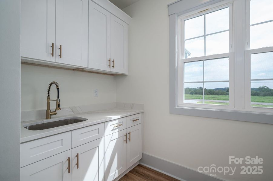 Furnished interior view inside a new home in , Vale (Image 10).