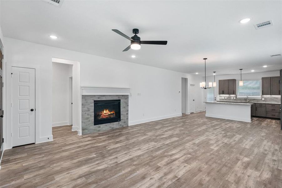 Open concept living, dining and kitchen Open concept living, dining and kitchen