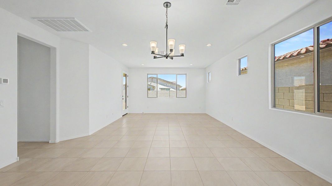 Representative furnished interior of a home built from the Acacia II by DRB Homes in Apache Farms, Buckeye (Image 8).