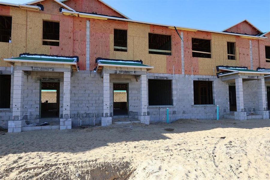 In-progress construction of a new home in Emerson Pointe, Apopka, FL (Image 8).