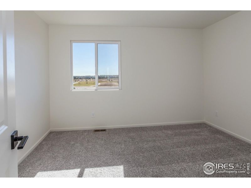 Spacious, unfurnished interior of a new home in Trailside Story Collection - Single Family Homes, Timnath (Image 27).