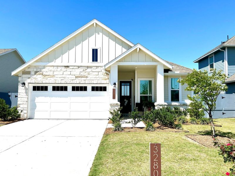 Front exterior of a home in the Lonestar Collection at Fulshear Lakes community, located in Fulshear, TX (Image 12). Front exterior of a home in the Lonestar Collection at Fulshear Lakes community, located in Fulshear, TX (Image 12).
