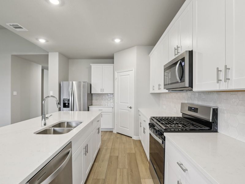 Furnished interior view inside a new home in Parks at Foster Crossing - Premier Series, Anna (Image 7).