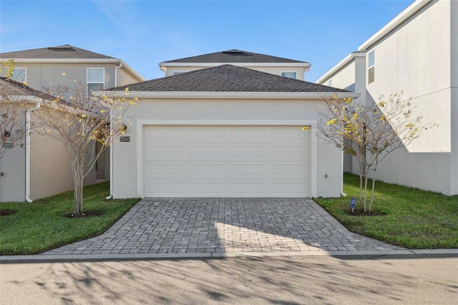 Front exterior of a new home in , Winter Garden, FL, highlighting curb appeal (Image 29).