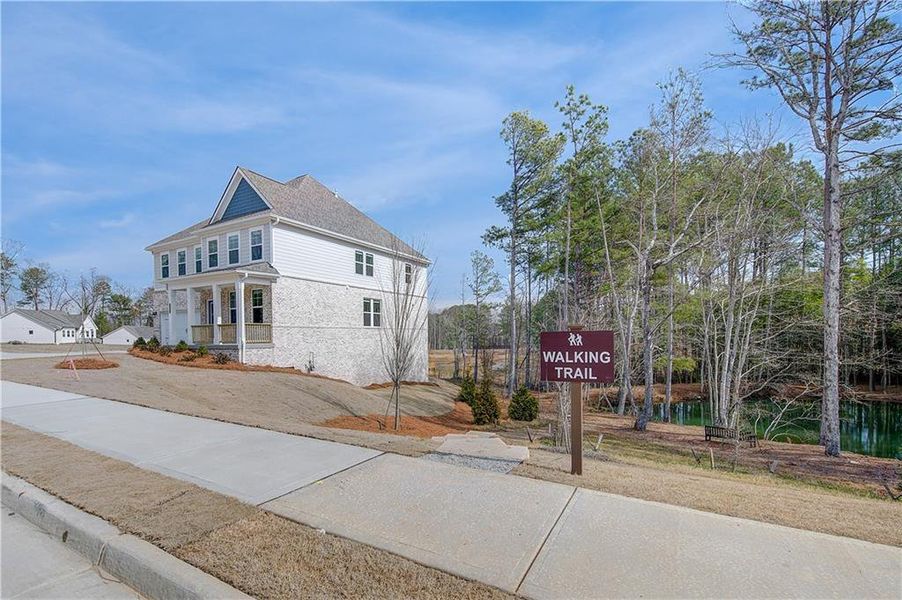 Front exterior of a new home in Hamilton Lakes, Lawrenceville, GA, highlighting curb appeal (Image 19). Front exterior of a new home in Hamilton Lakes, Lawrenceville, GA, highlighting curb appeal (Image 19).
