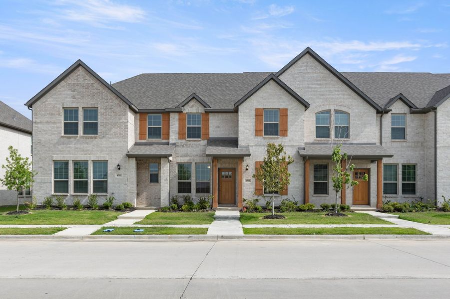 Front exterior of a new home in Sanger Circle – Townhomes, Sanger, TX, highlighting curb appeal (Image 1). Front exterior of a new home in Sanger Circle – Townhomes, Sanger, TX, highlighting curb appeal (Image 1).