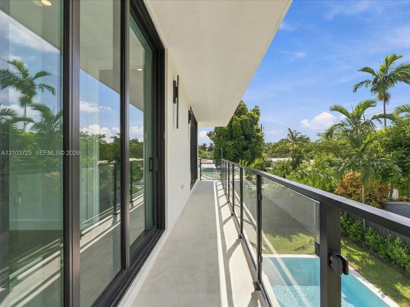Exterior details and patio area of a home in , Miami (Image 3).