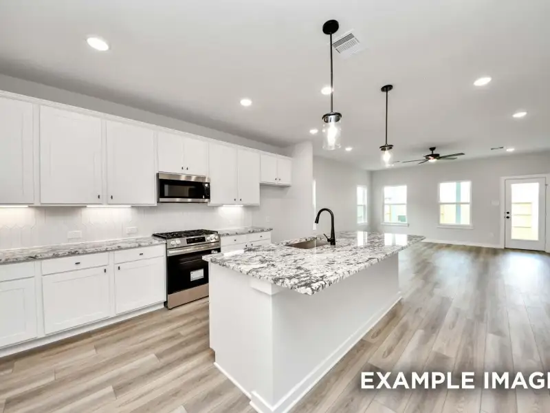 Furnished interior view inside a new home in Sundance Cove, Crosby (Image 6).