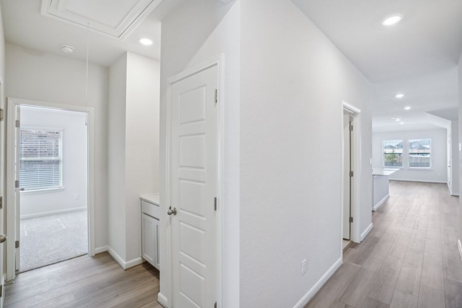 Hallway in the Callaghan floorplan at a Meritage Homes community.