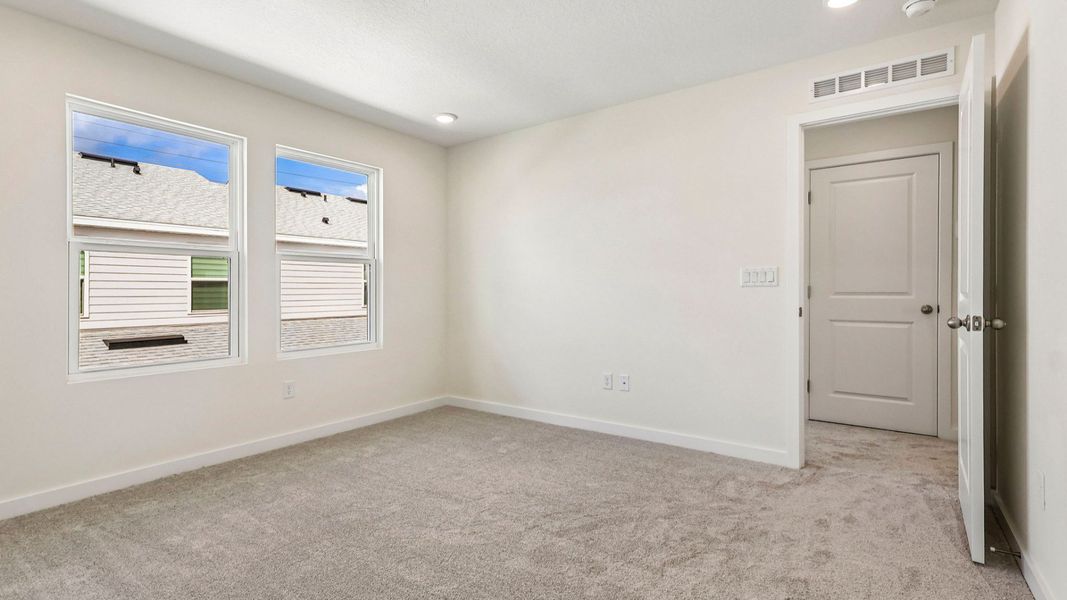 Furnished interior view inside a new home in Cyrene at Harmony, St. Cloud (Image 24).