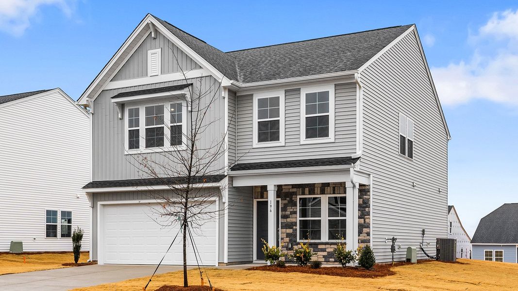 Front exterior of a new home in Fieldstone, Lexington, NC, highlighting curb appeal (Image 2).