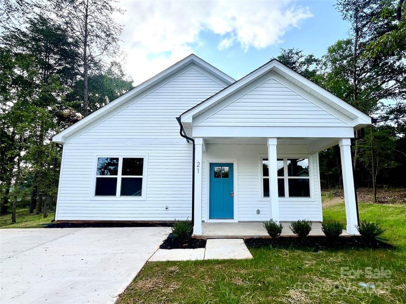 Front exterior of a new home in , Granite Falls, NC, highlighting curb appeal (Image 17).