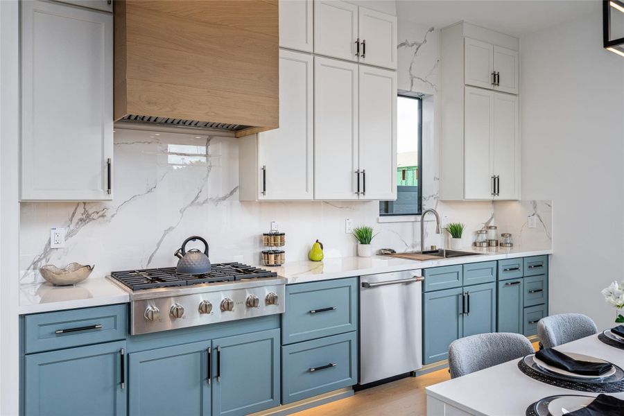 The kitchen/dining area features bespoke chandeliers and a tray ceiling with wood inlays, offering a truly refined dining experience The kitchen/dining area features bespoke chandeliers and a tray ceiling with wood inlays, offering a truly refined dining experience