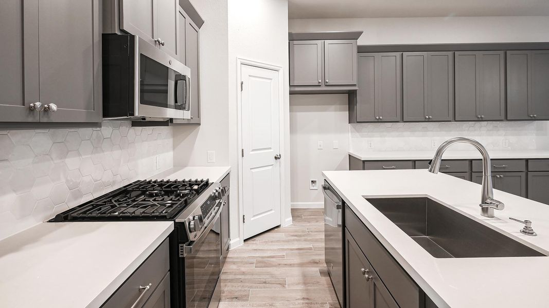 Furnished interior view inside a new home in Crosswinds 40', Kyle (Image 6).