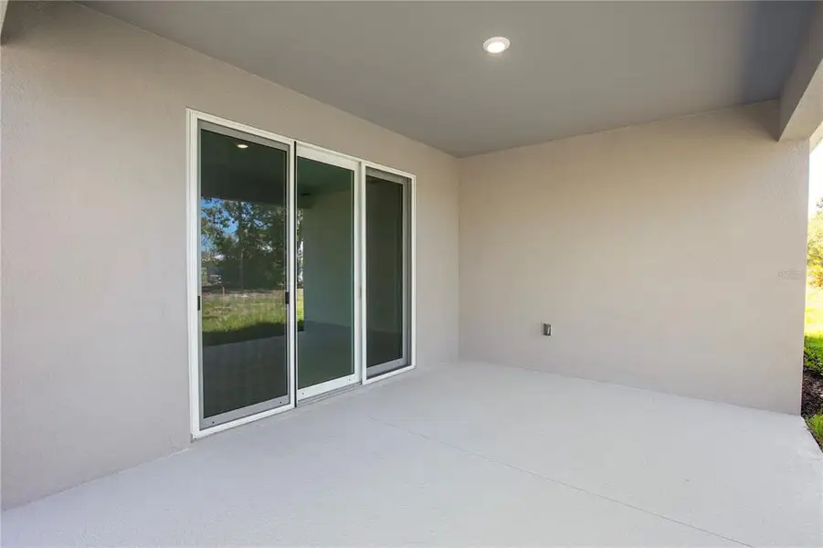 Exterior details and patio area of a home in Burnt Store Village, Punta Gorda (Image 4).
