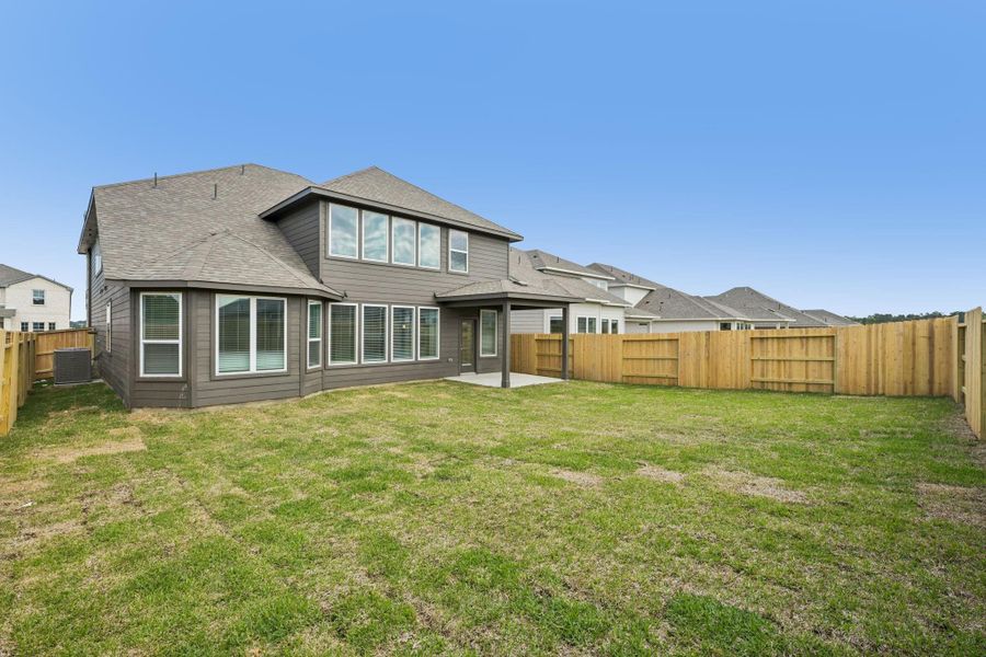 Exterior details and patio area of a home in Riviera Pines - Classic Series, Huffman (Image 3). Exterior details and patio area of a home in Riviera Pines - Classic Series, Huffman (Image 3).