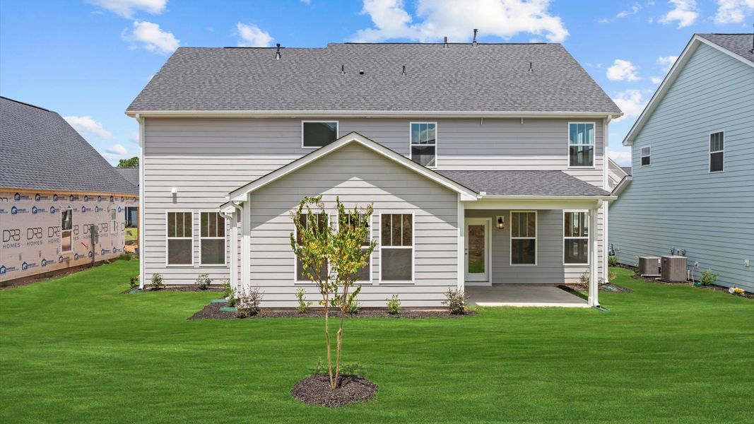 Front exterior of a new home in Wells Crossing, Seneca, SC, highlighting curb appeal (Image 19).