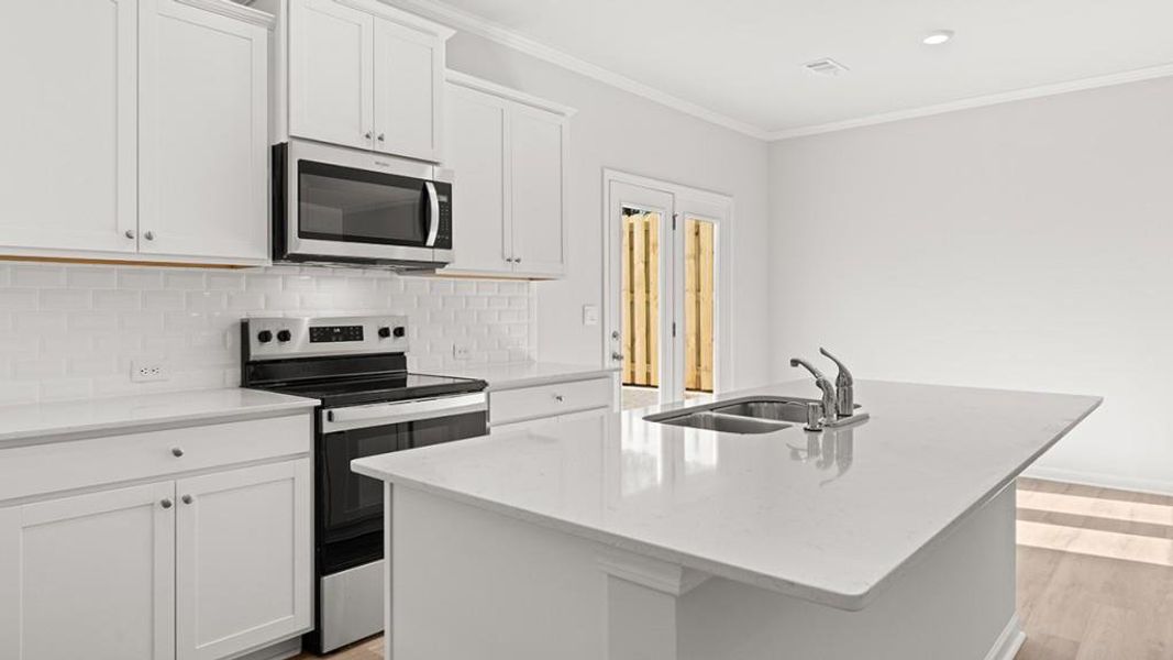 Furnished interior view inside a new home in Waypoint, Flowery Branch (Image 7).