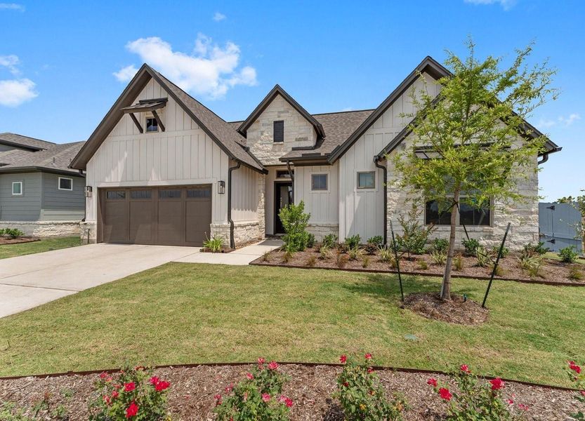 Front exterior of a new home in , Fulshear, TX, highlighting curb appeal (Image 20). Front exterior of a new home in , Fulshear, TX, highlighting curb appeal (Image 20).
