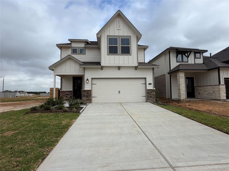 Front exterior of a new home in Bergamo, Katy, TX, highlighting curb appeal (Image 1). Front exterior of a new home in Bergamo, Katy, TX, highlighting curb appeal (Image 1).