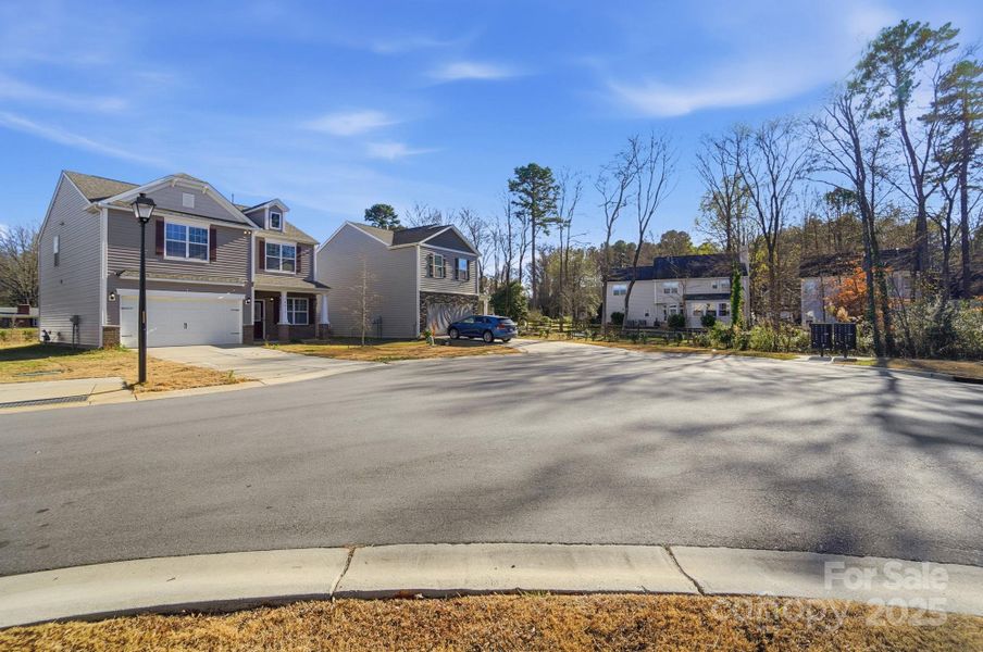 Front exterior of a new home in , Charlotte, NC, highlighting curb appeal (Image 26). Front exterior of a new home in , Charlotte, NC, highlighting curb appeal (Image 26).